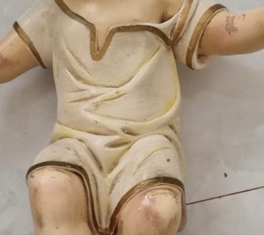 Menino Jesus antes da restauração